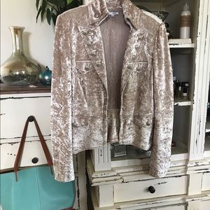 Unique jacket cream color. Velvet type material.